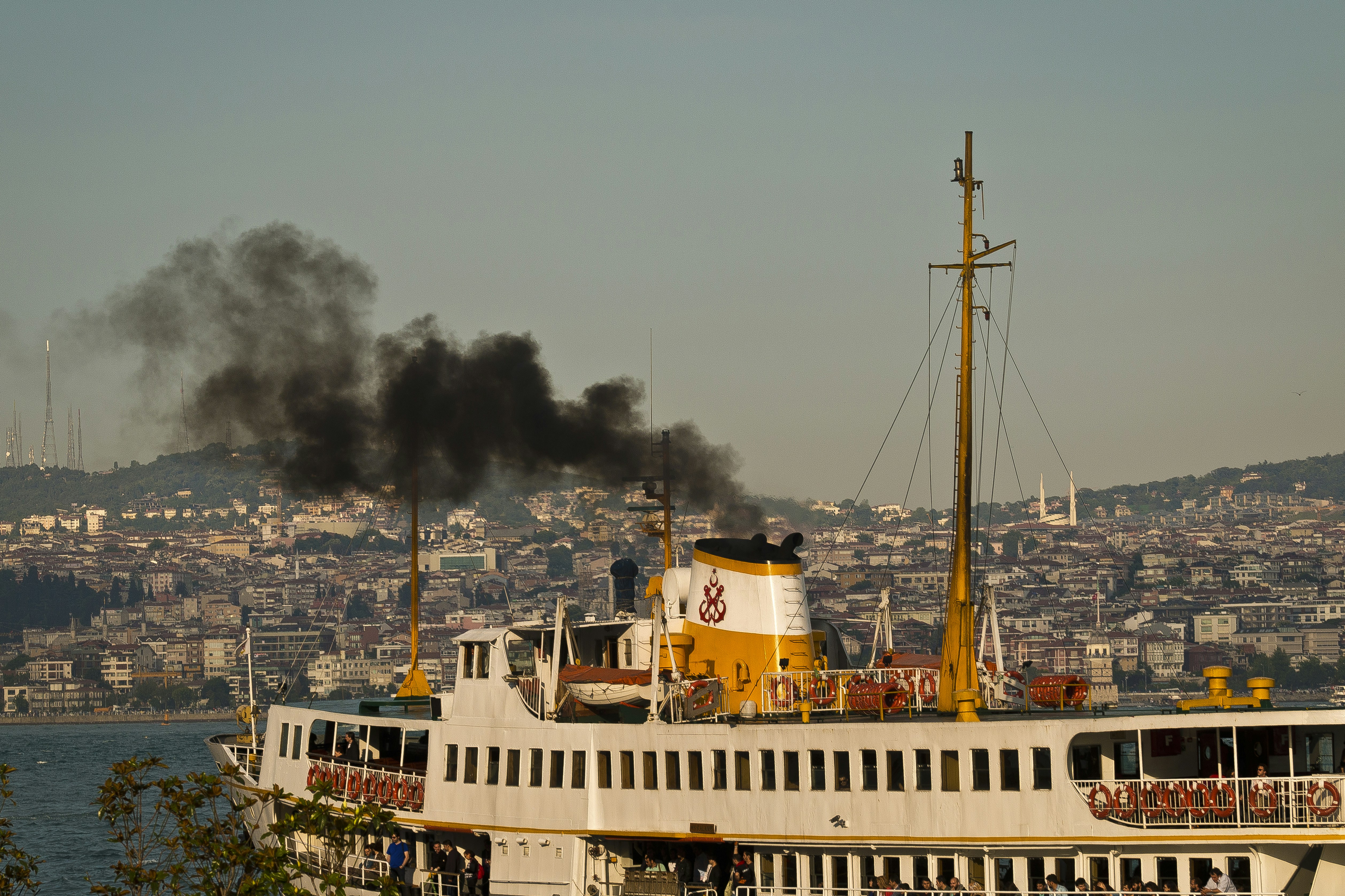 white and yellow boat