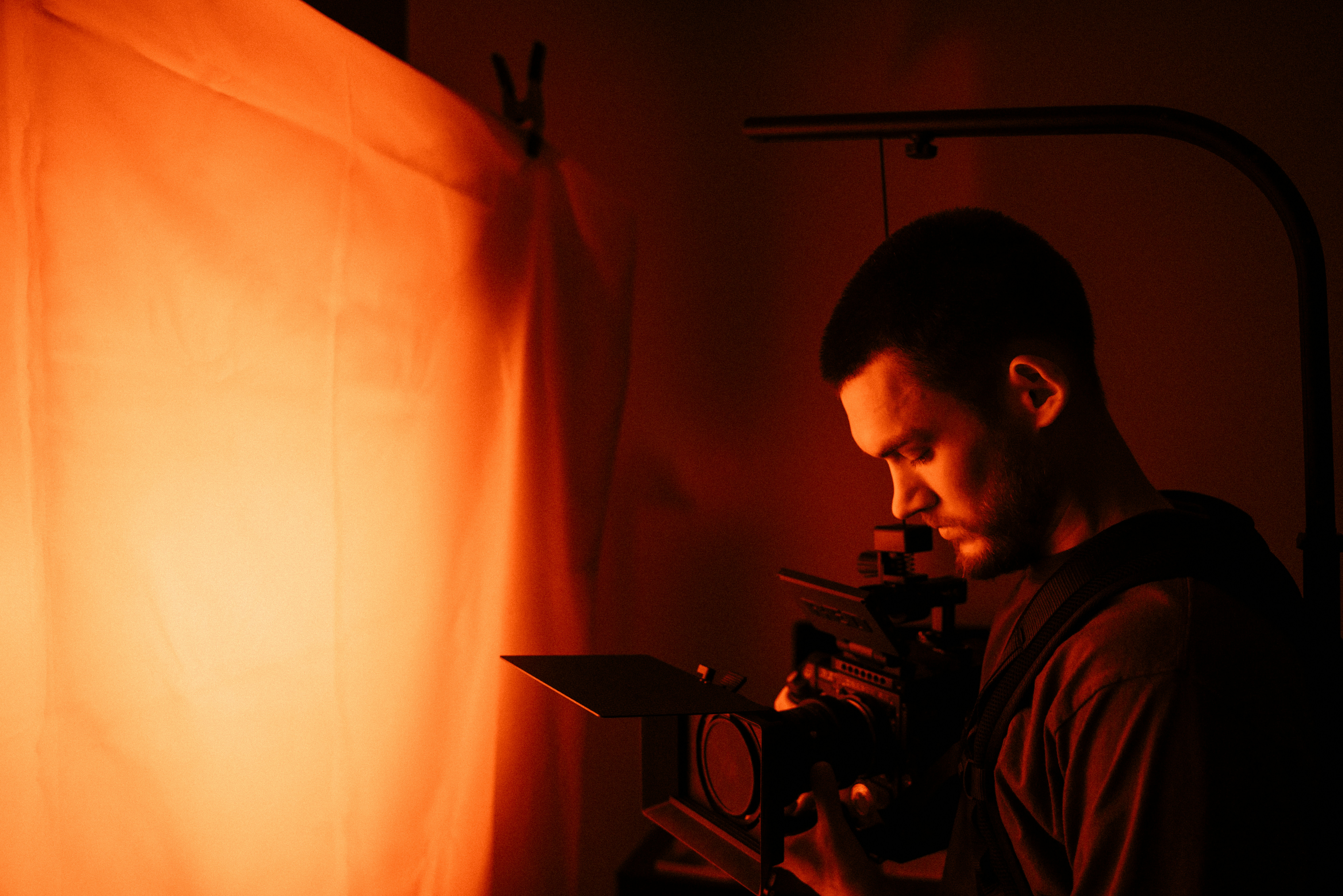 man holding DSLR camera