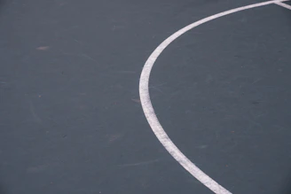 Detailed view of a durable, clean school sports court floor surface.