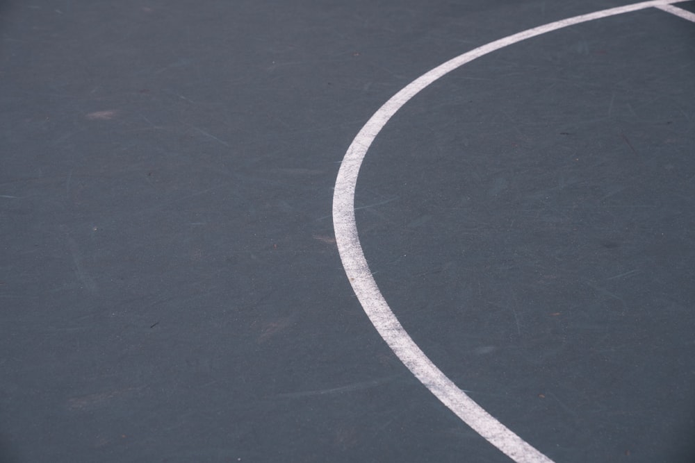 a person on a tennis court with a racquet