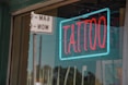 lighted red and green Tattoo neon signage