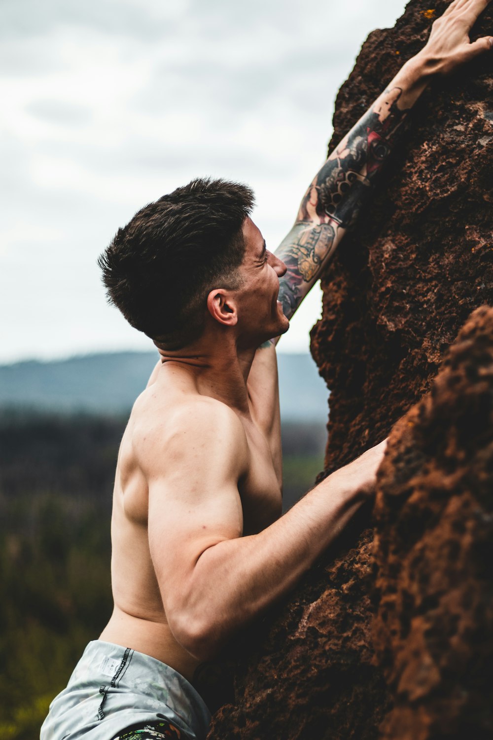 topless man close-up photography