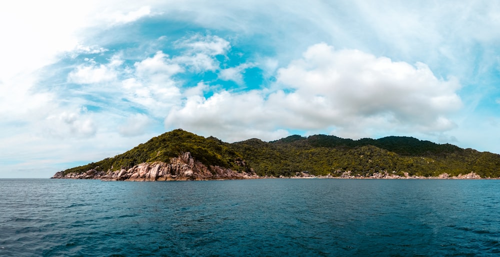 body of water near mountain