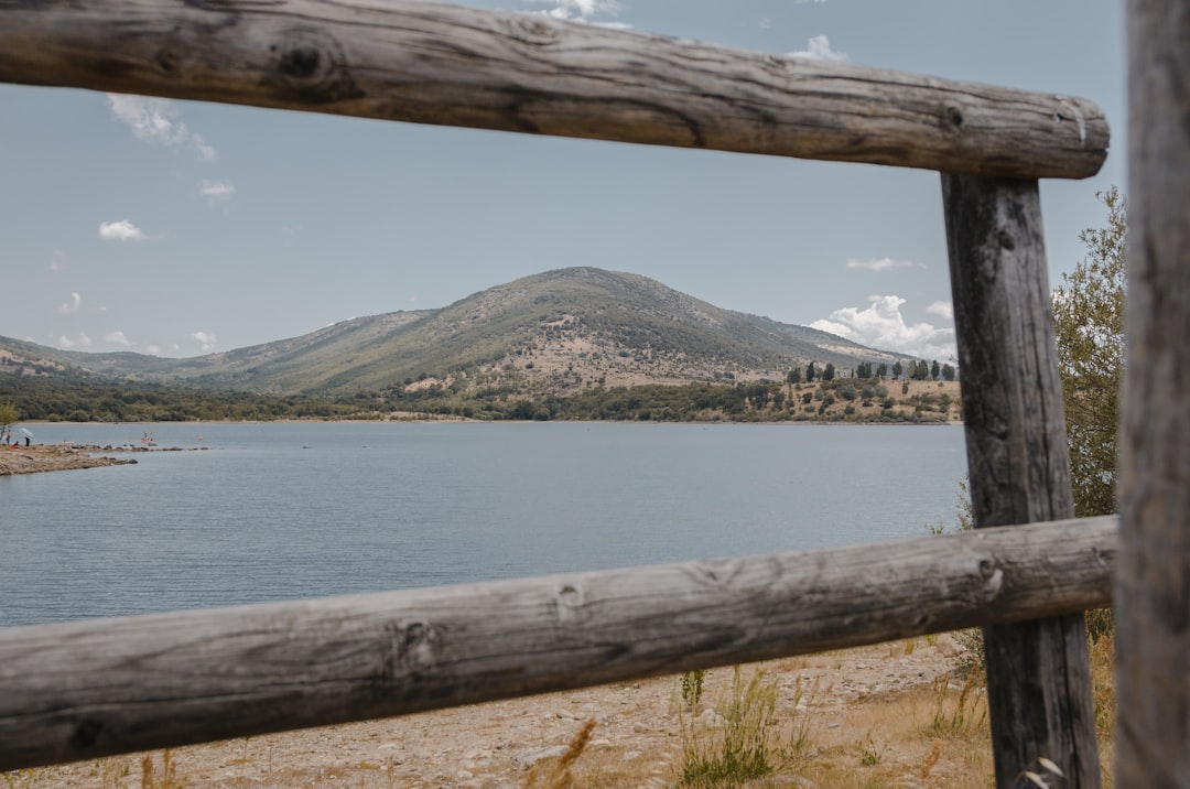 landscape photo of mountain near body of water during daytime