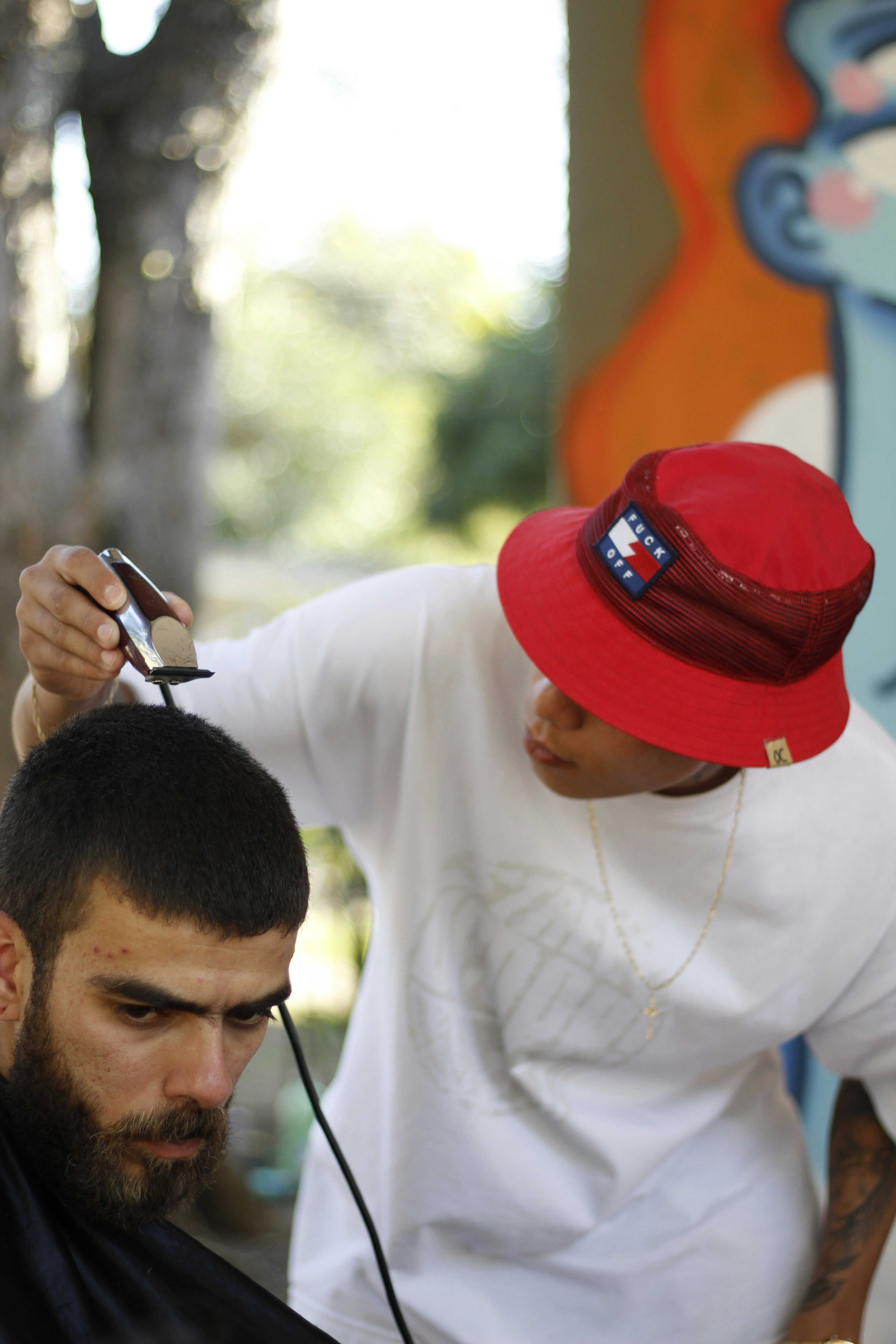 Volunteers giving haircuts