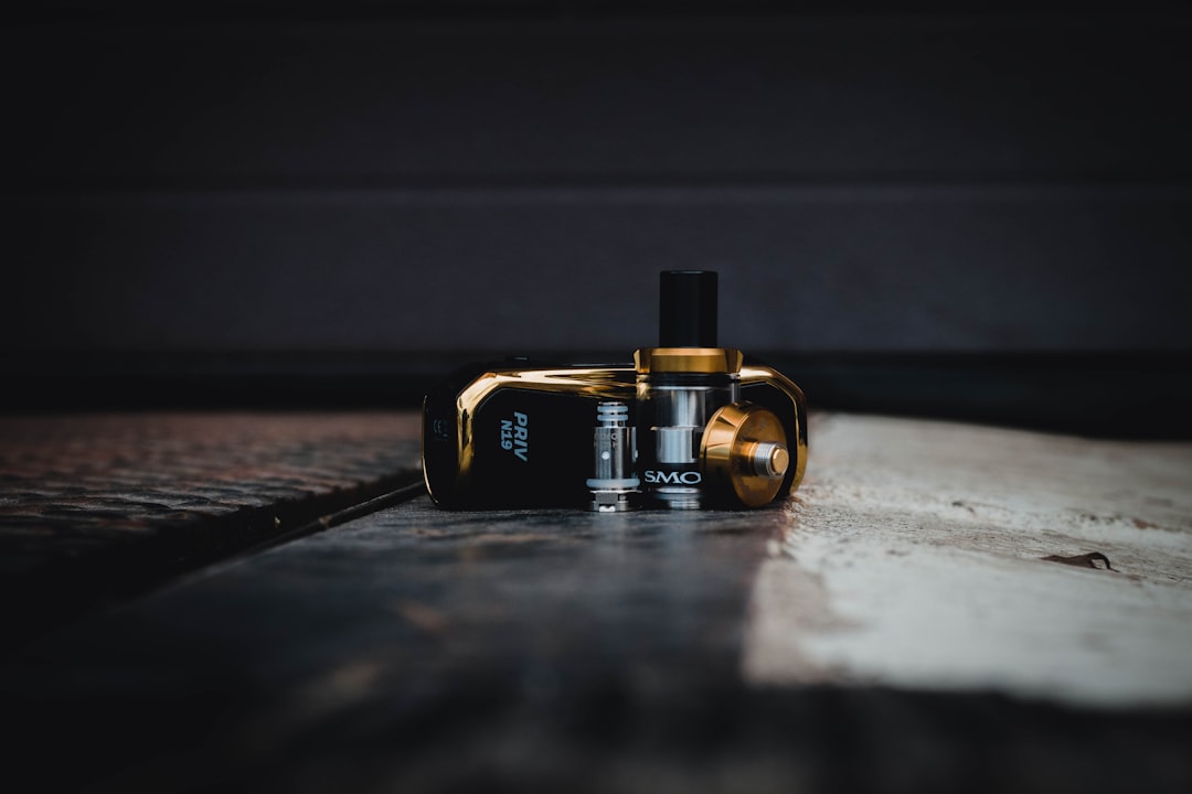 black and yellow box mod vape