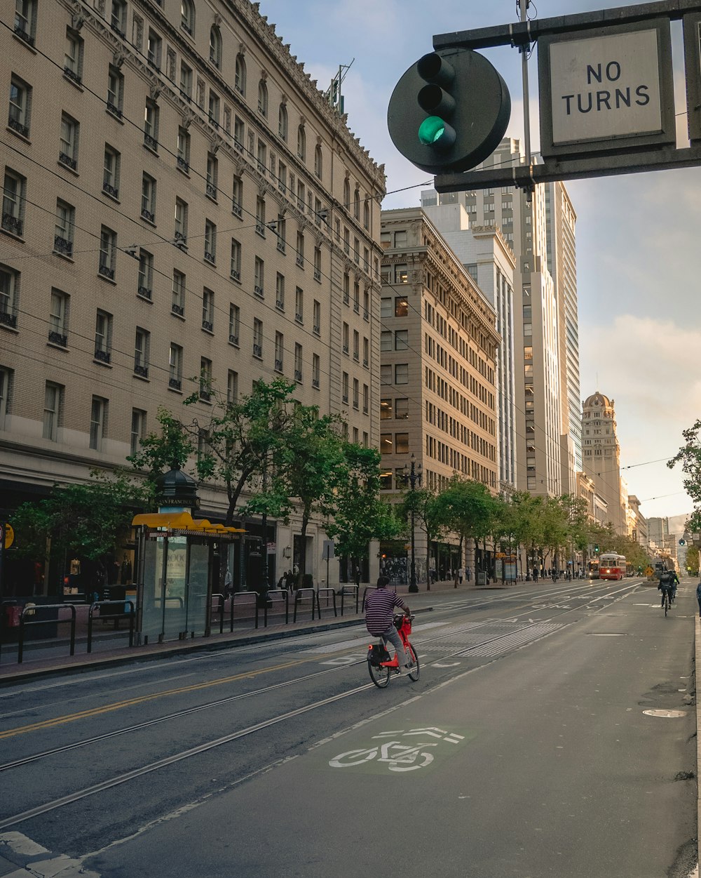 person riding bike during daytime