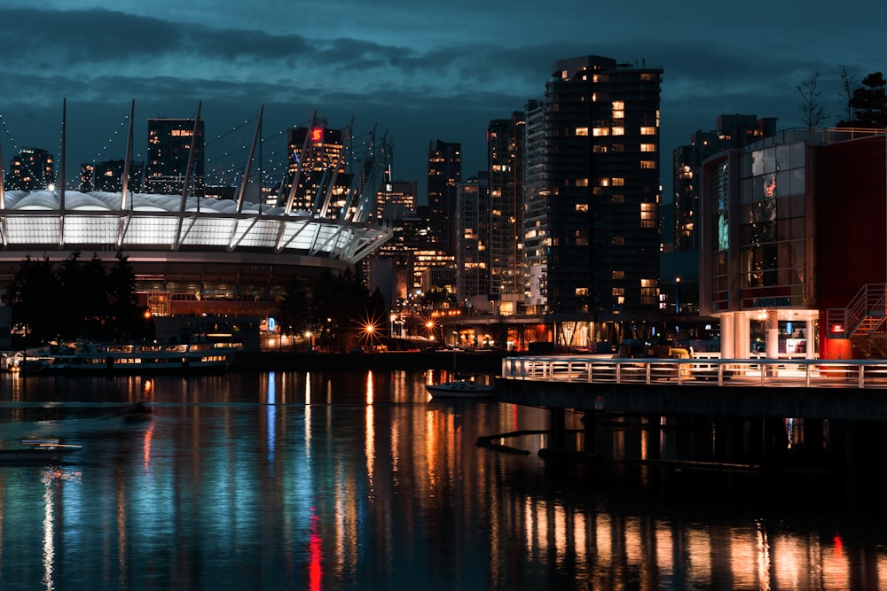 city buildings and body of water