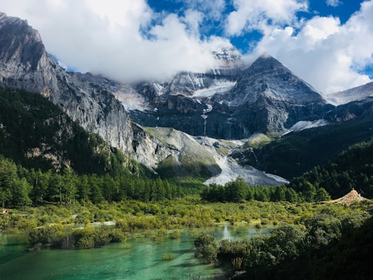 landscape photography of mountain during daytime in Yading China