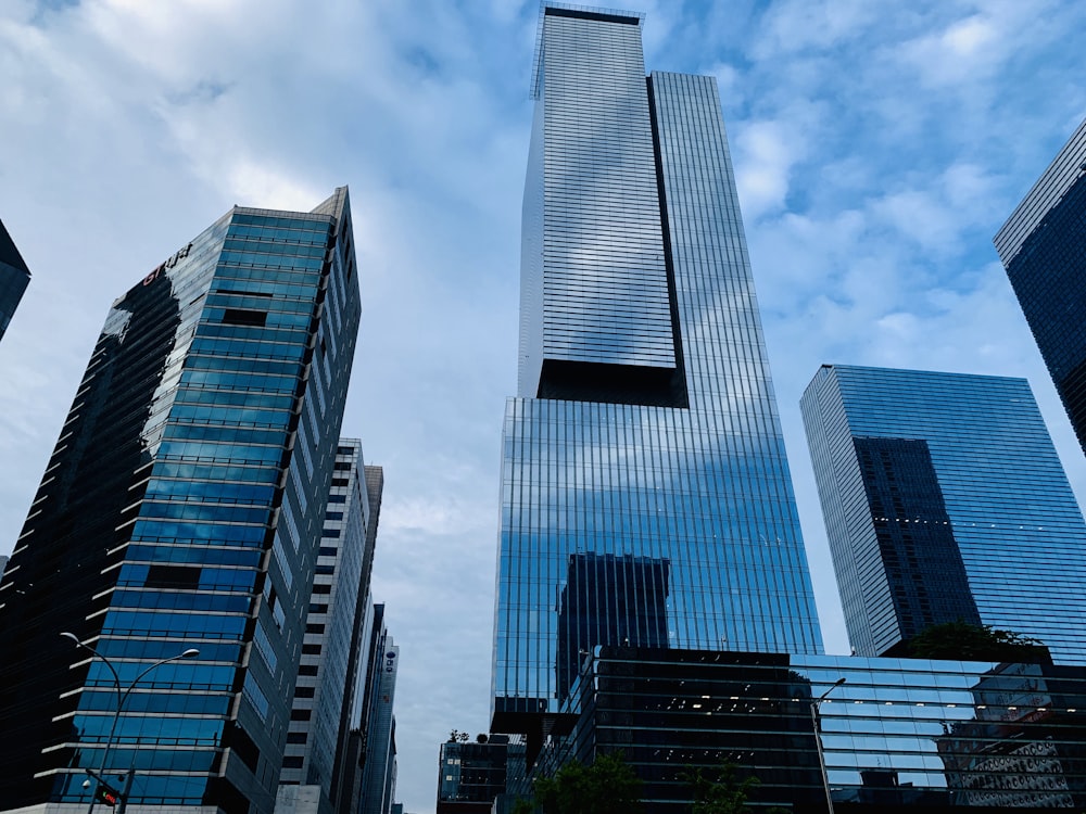 high-rise buildings under blue sky