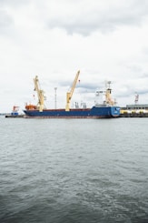 a large blue and white boat in a body of water