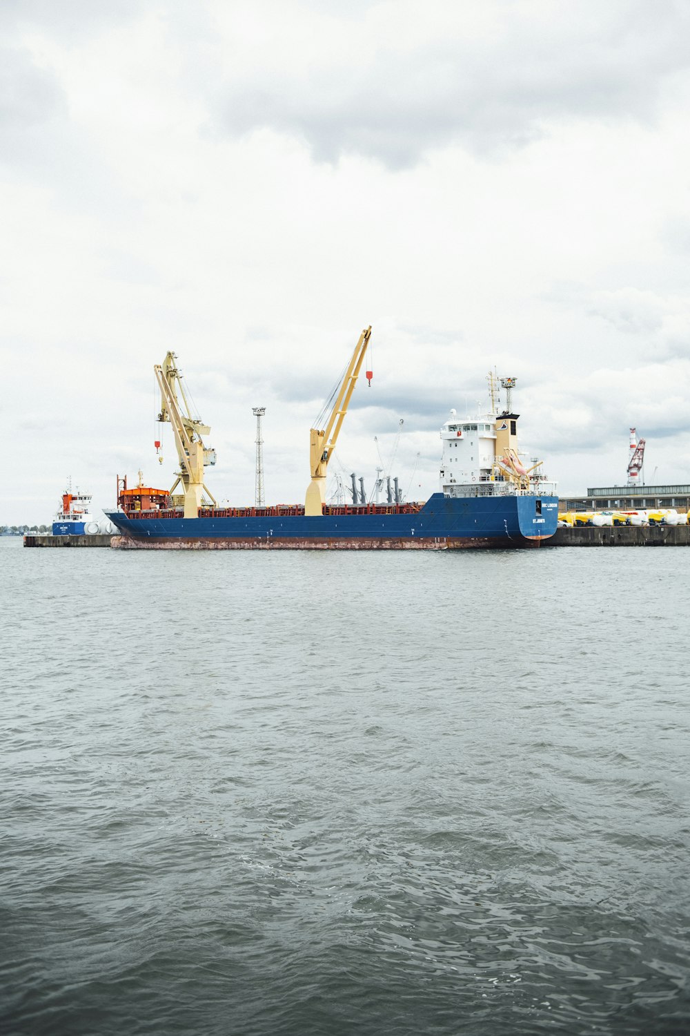 a large blue and white boat in a body of water