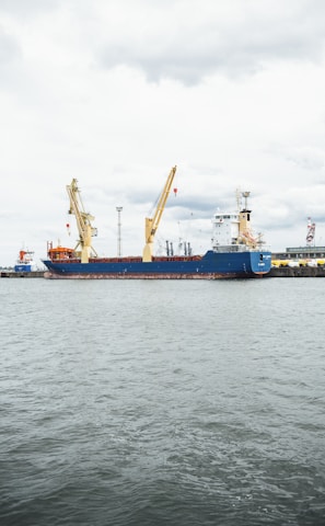 a large blue and white boat in a body of water