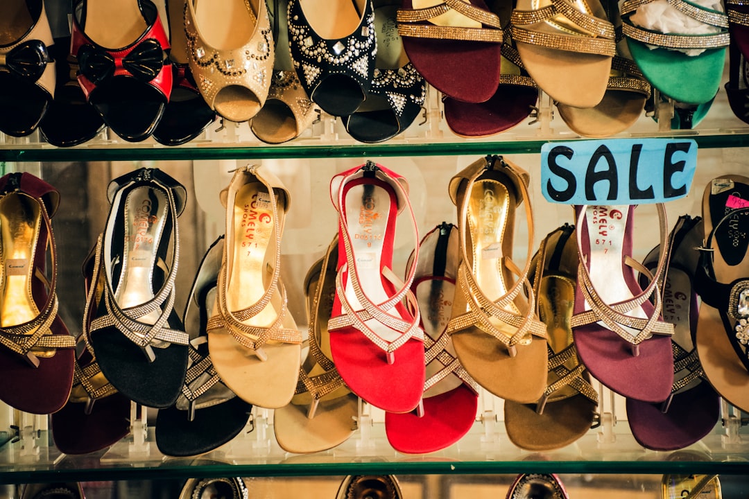 assorted sandals on display, Trendy summer footwear for females