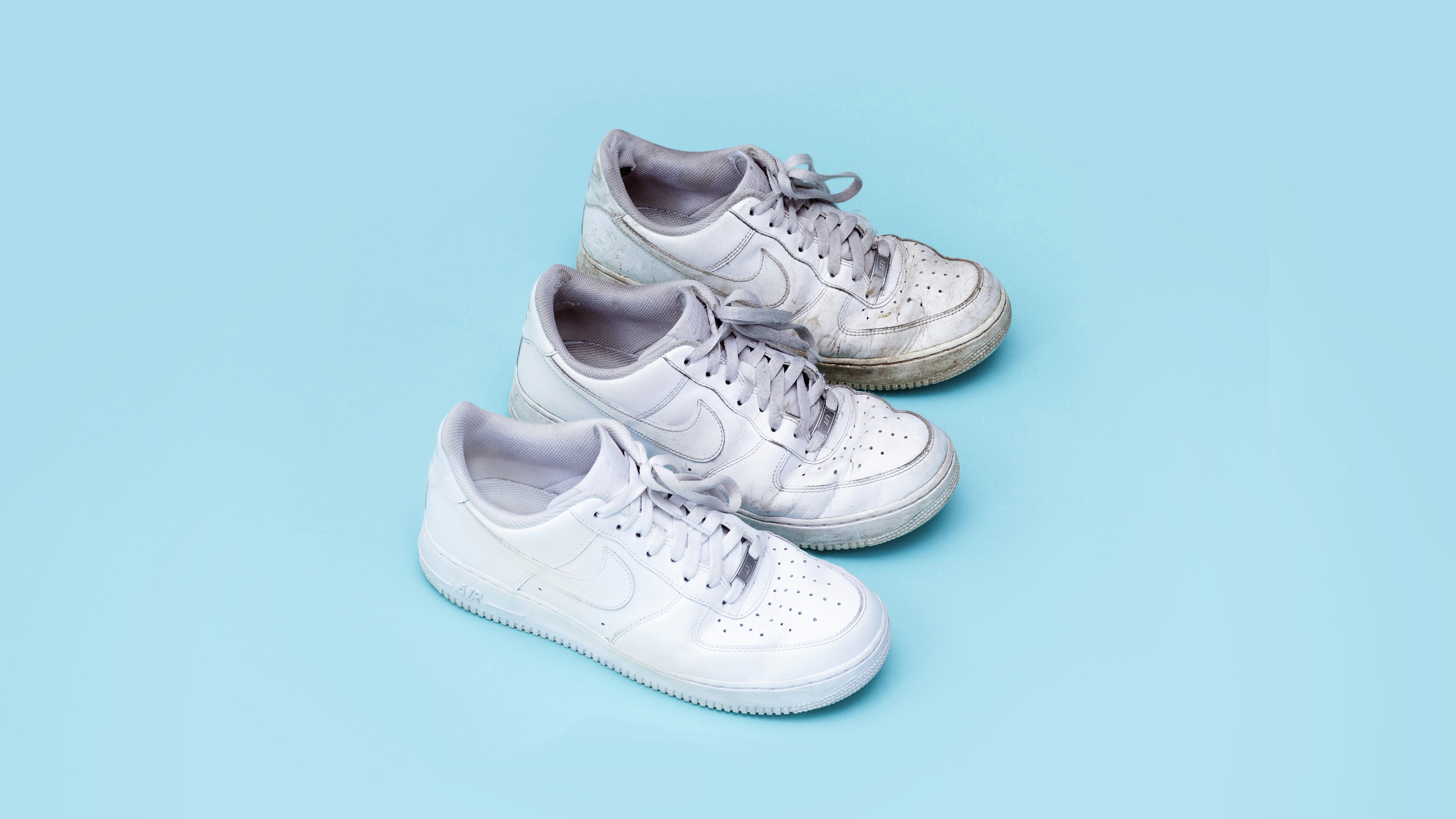 three white sneakers