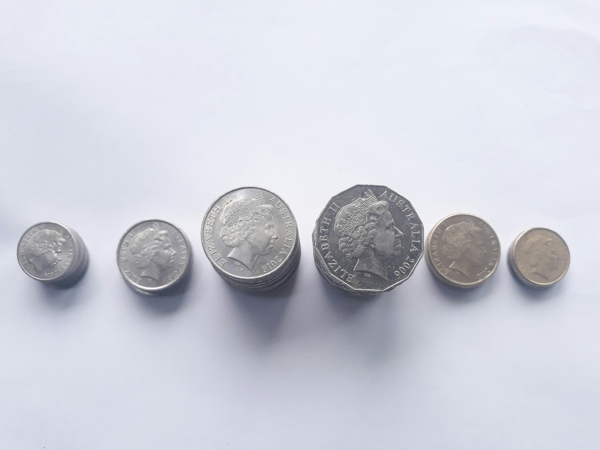 round silver-colored coin