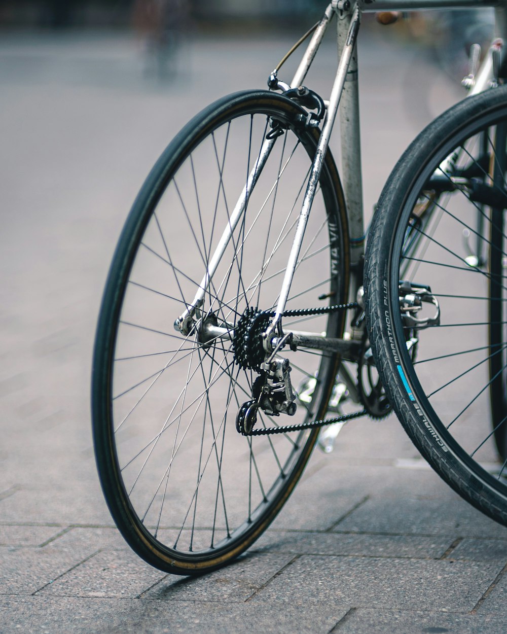 shallow focus photo of gray bike