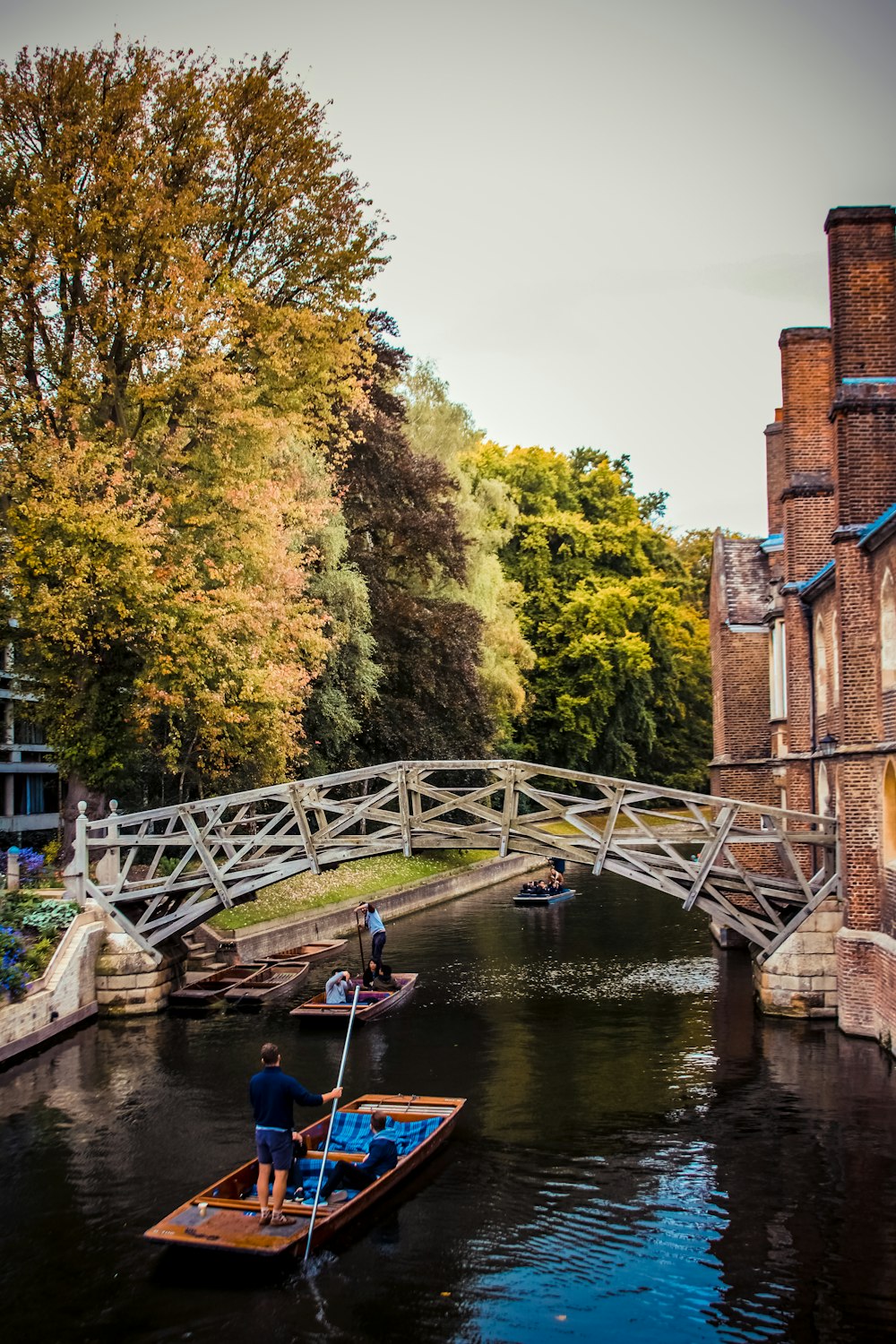 sailing boats under bridge