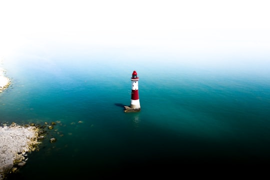 red and white lighthouse top view in Beachy Head Lighthouse United Kingdom