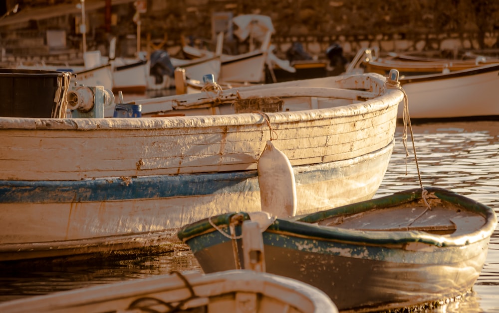 wooden boats on dock at daytime