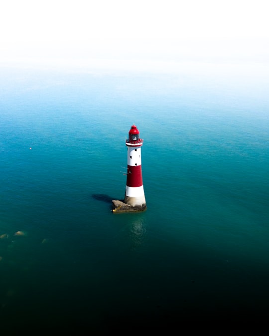 white and red tower in Beachy Head Lighthouse United Kingdom