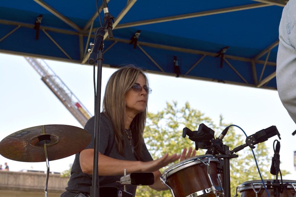 woman playing drums