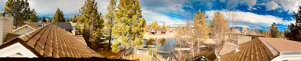 a panoramic view of a house and trees