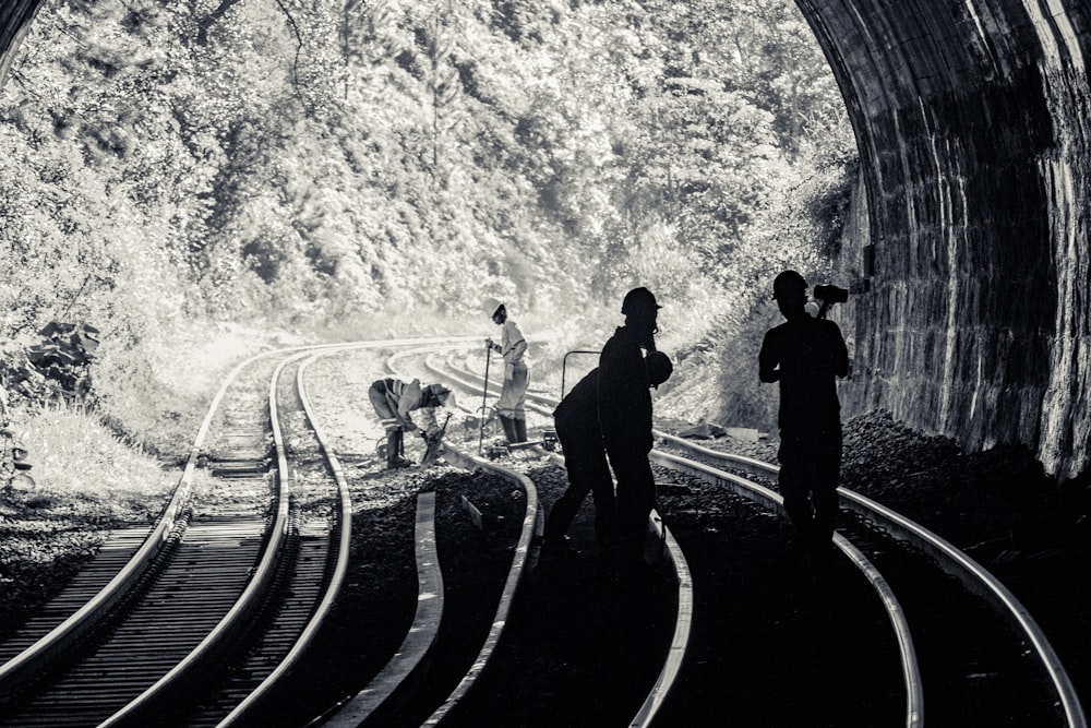 people working on train railway