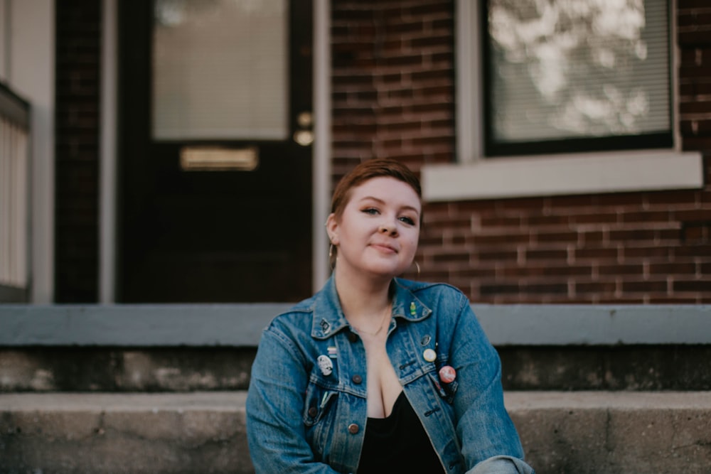 woman wearing denim jacket