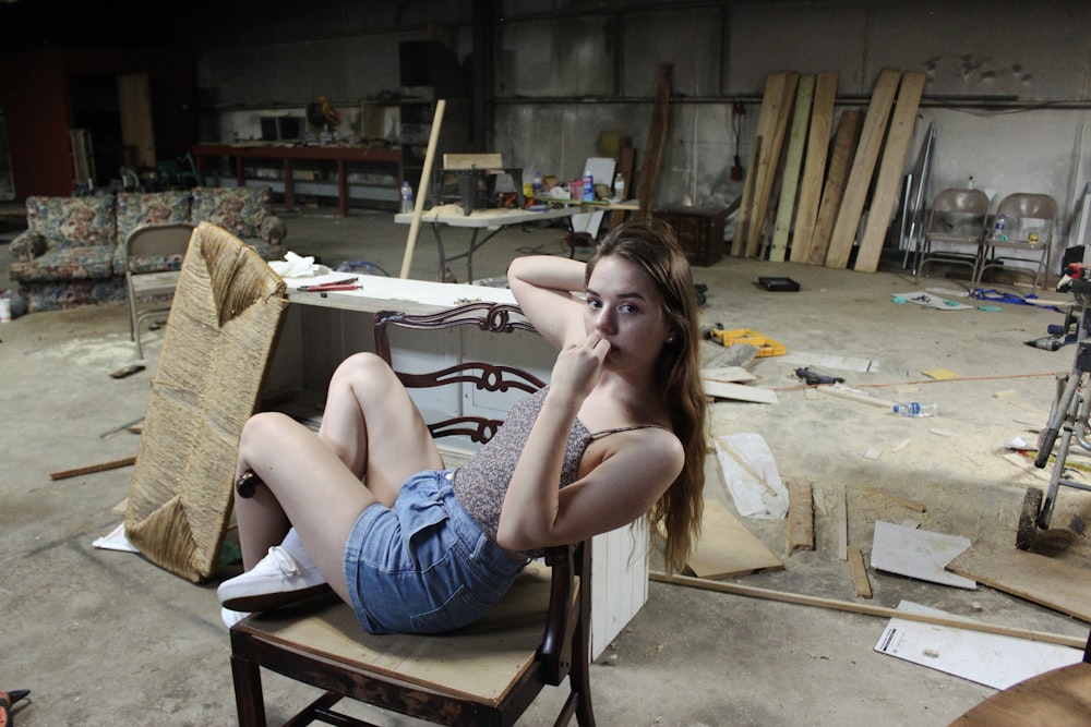 women sitting in a chair in a room