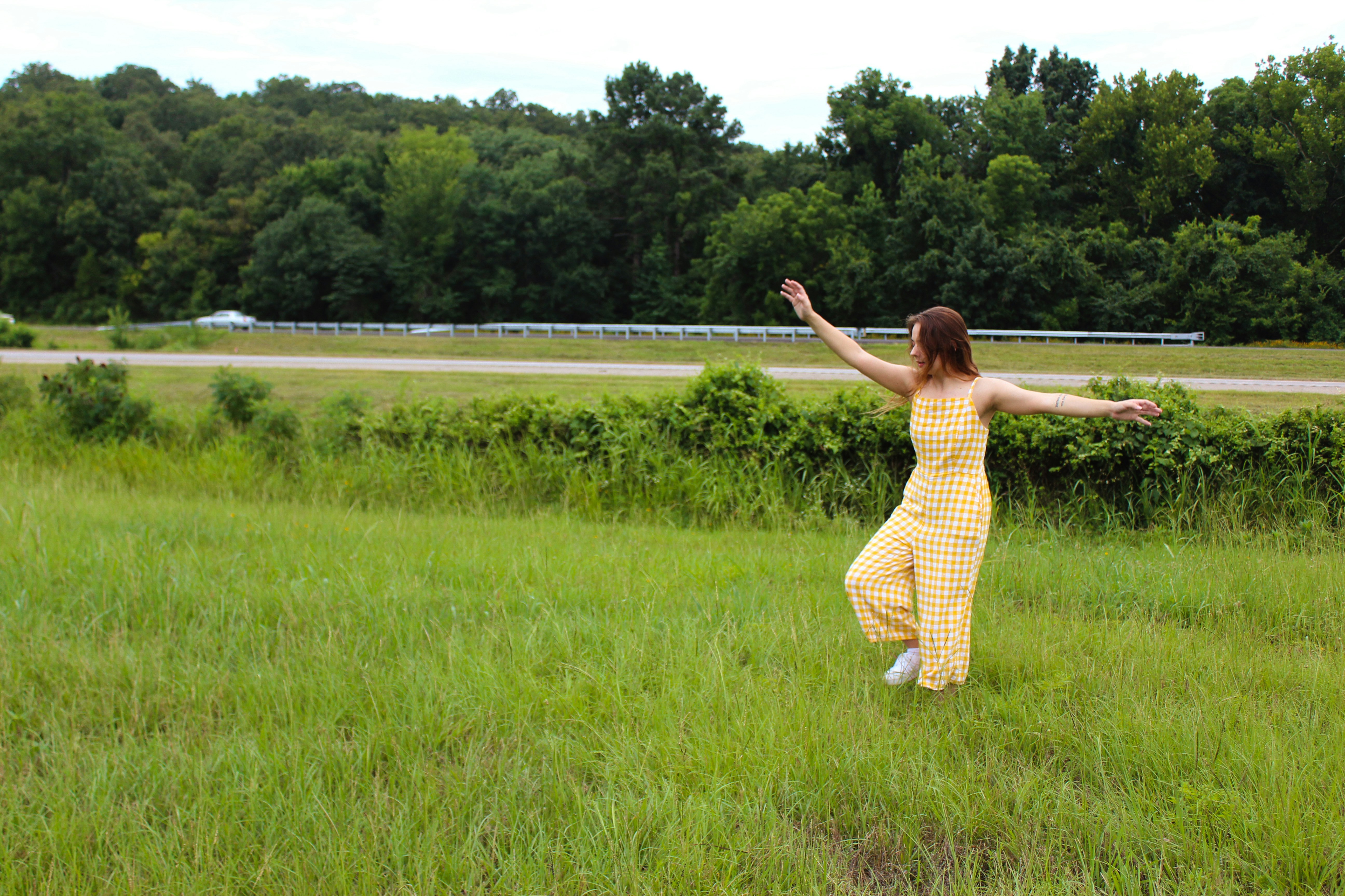 woman wearing yellow jumpsuit