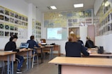 people sitting inside room