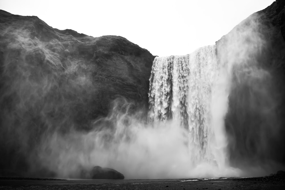 greyscale photo of waterfalls