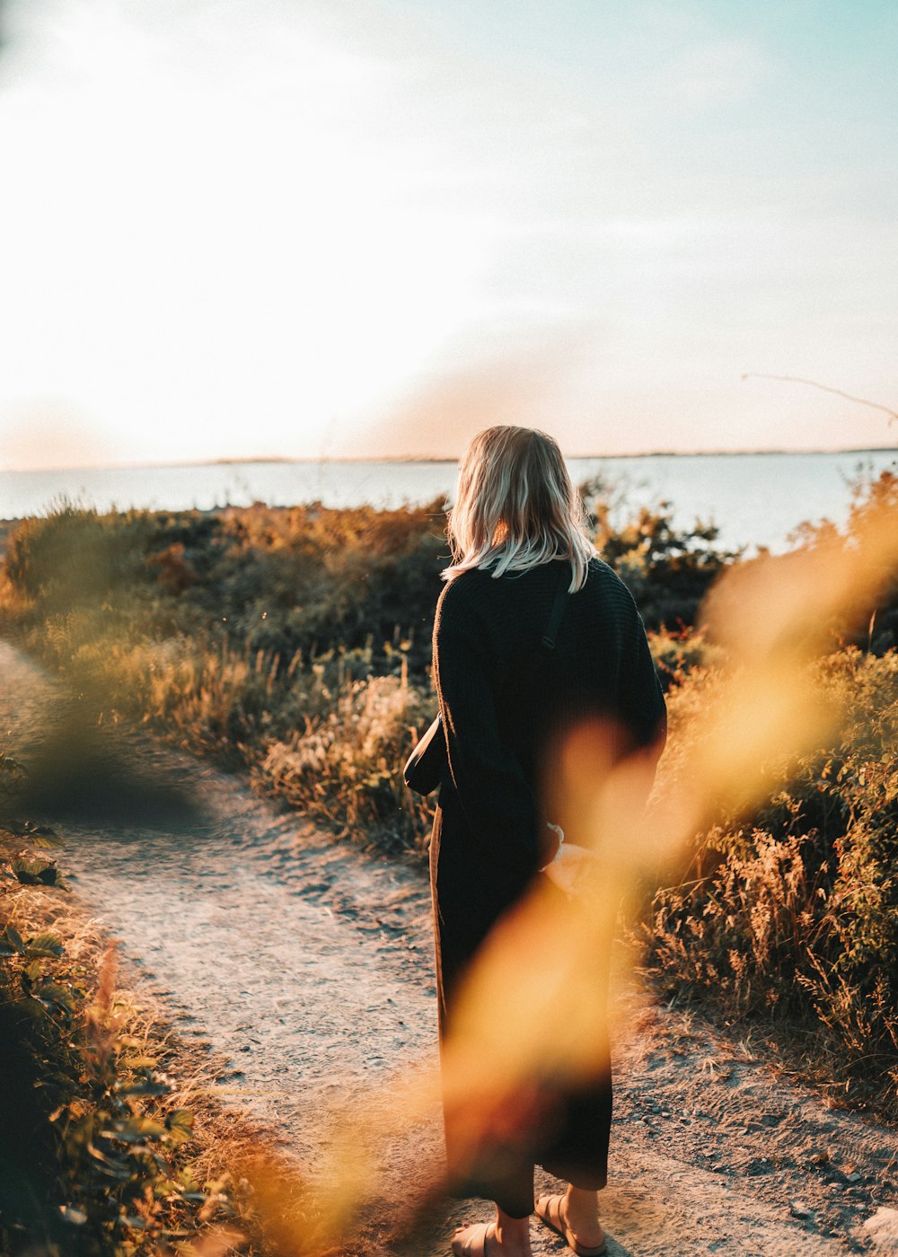 woman wearing black coat screenshot