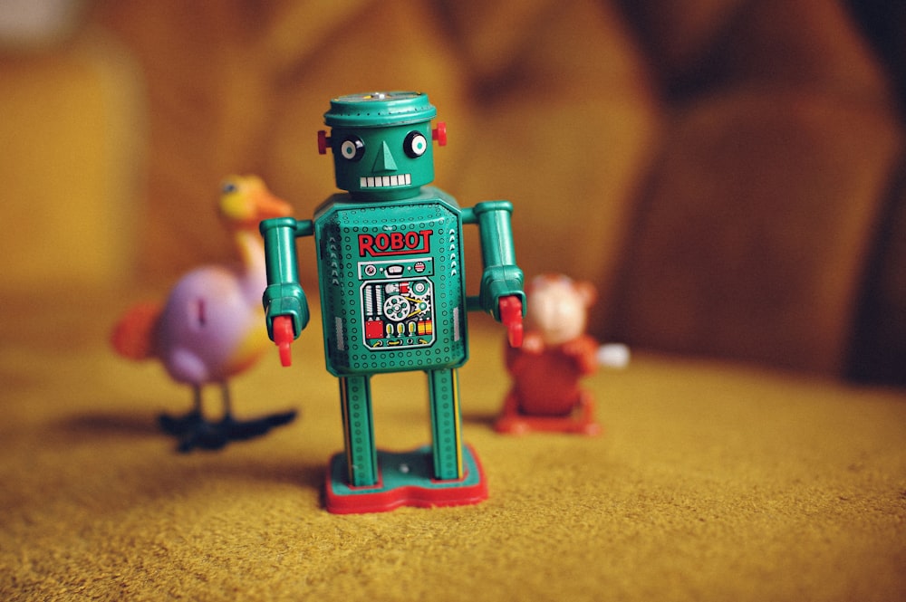 green and multicolored robot figurine