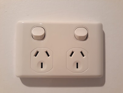 A modern wall switch and socket display.