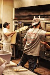 man in gray and red printed crew-neck t-shirt