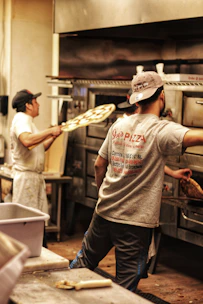 man in gray and red printed crew-neck t-shirt