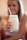 woman holding glass jar