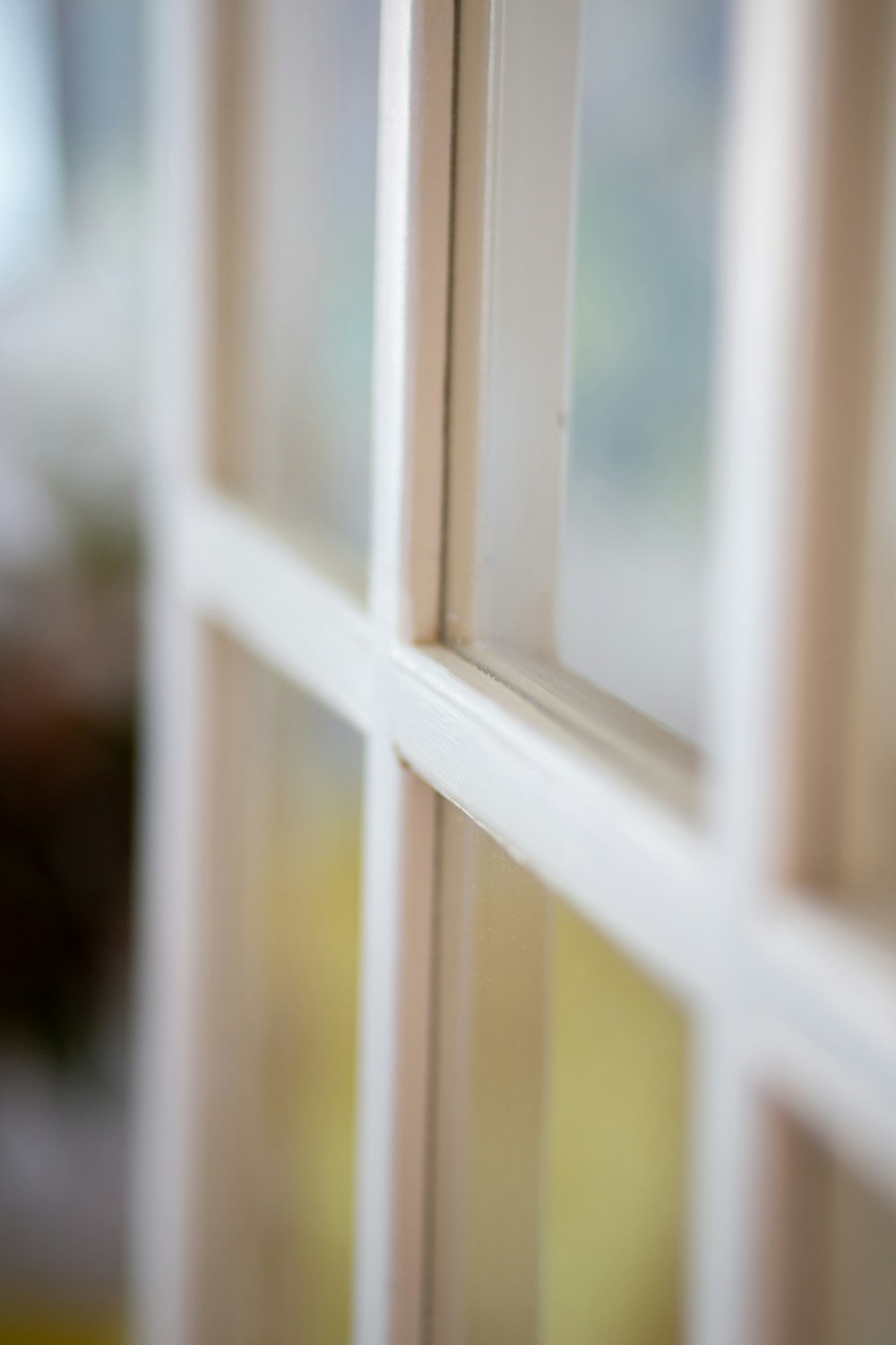 white wooden framed glass window