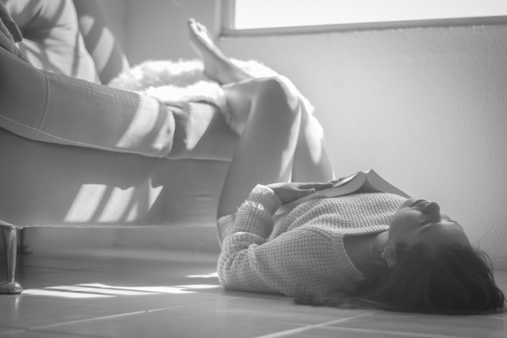 woman lying on floor