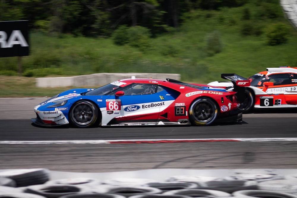 blue and red vehicle on road