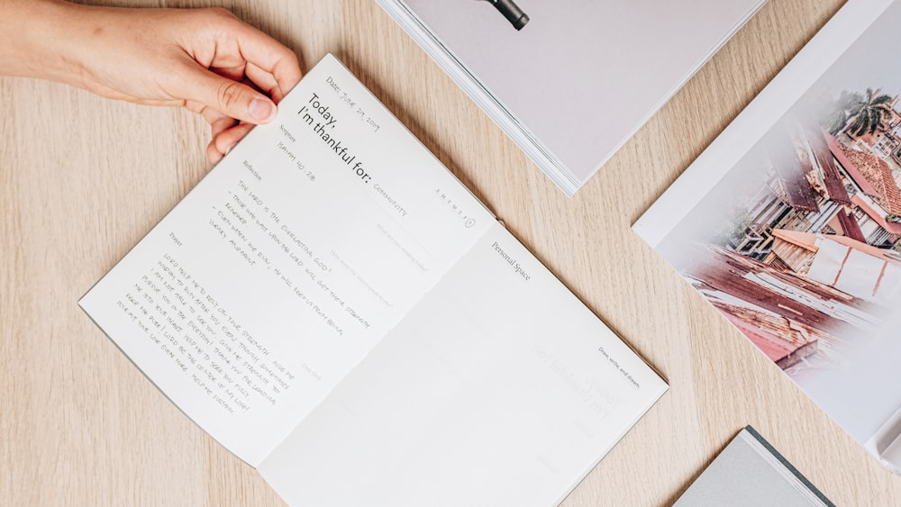 person holding book