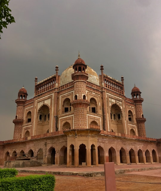 brown mosque under gray sky in Safdarjung Tomb India