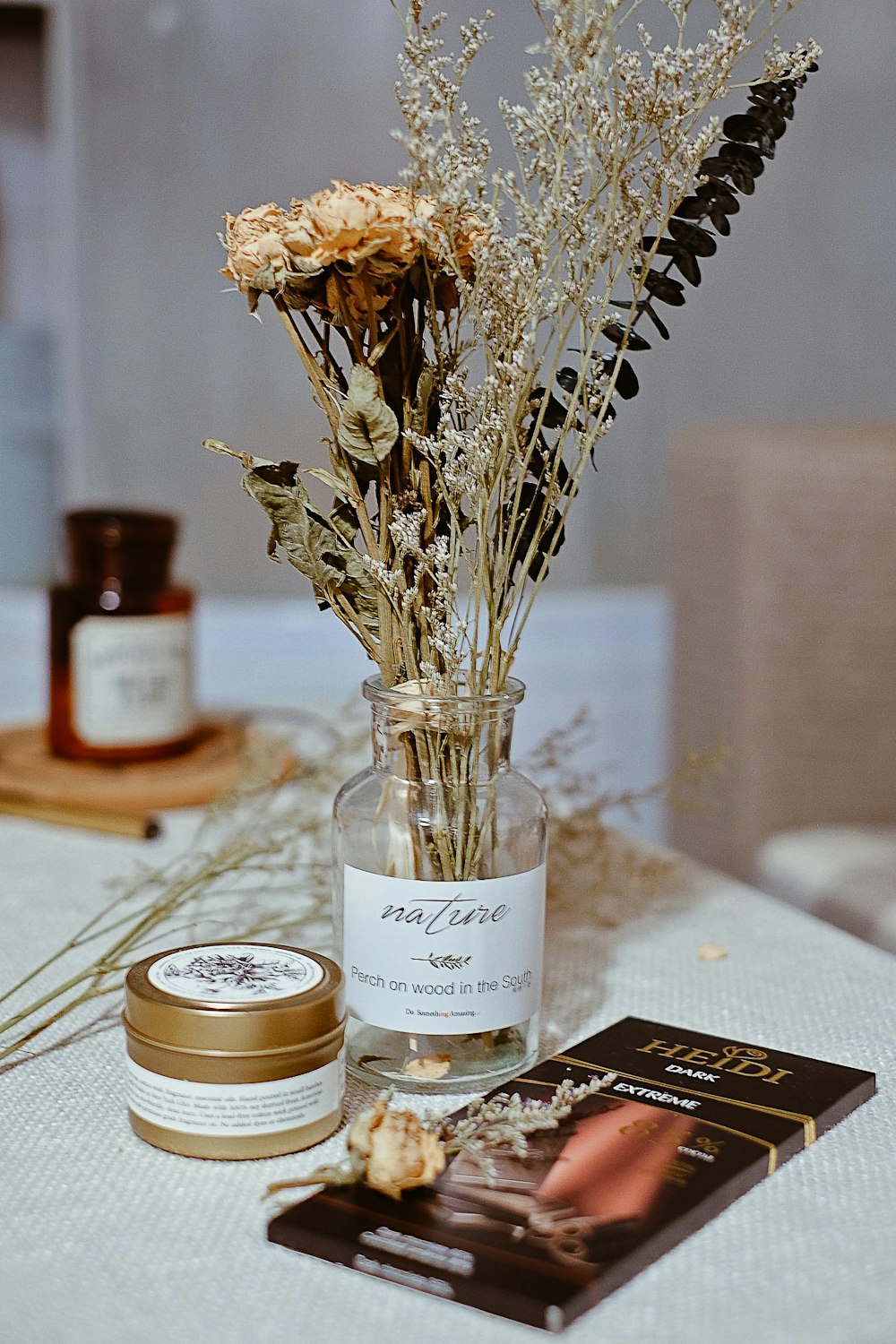 Nature glass vase beside Heidi chocolate bar