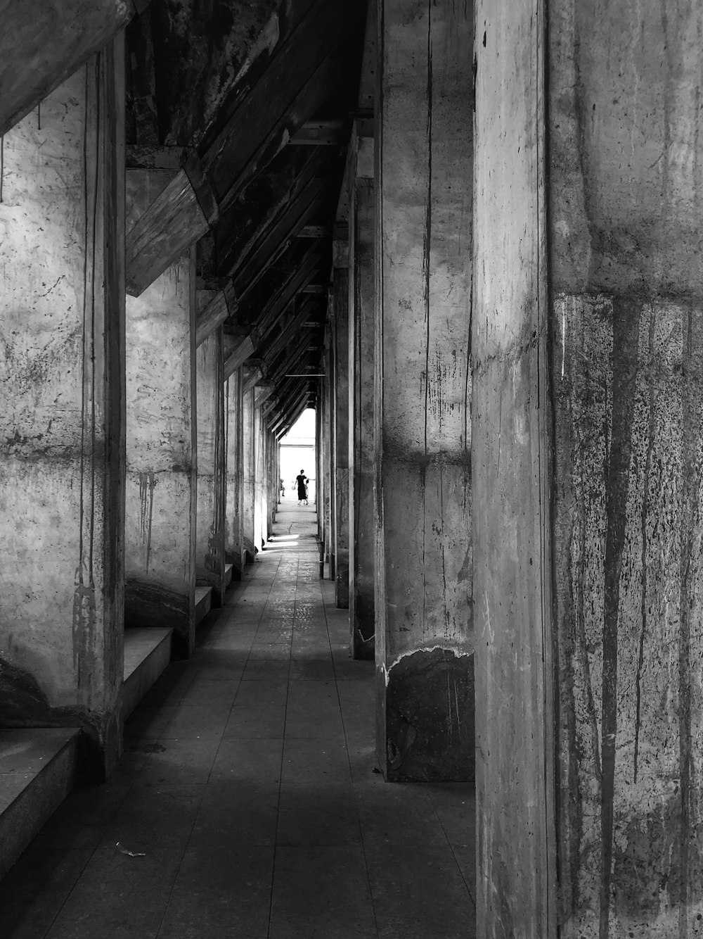 grayscale photo of hallway