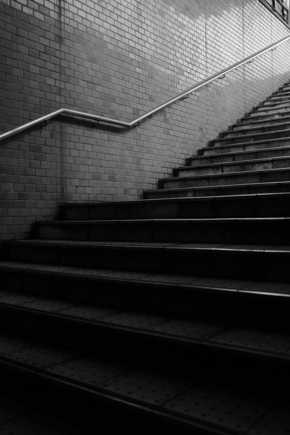 grayscale photograph of stairs