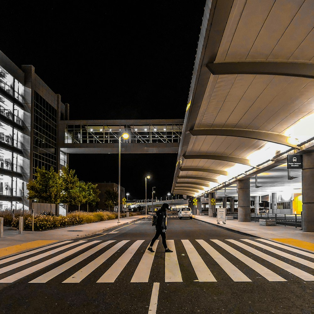 person walking on pedestrian lane