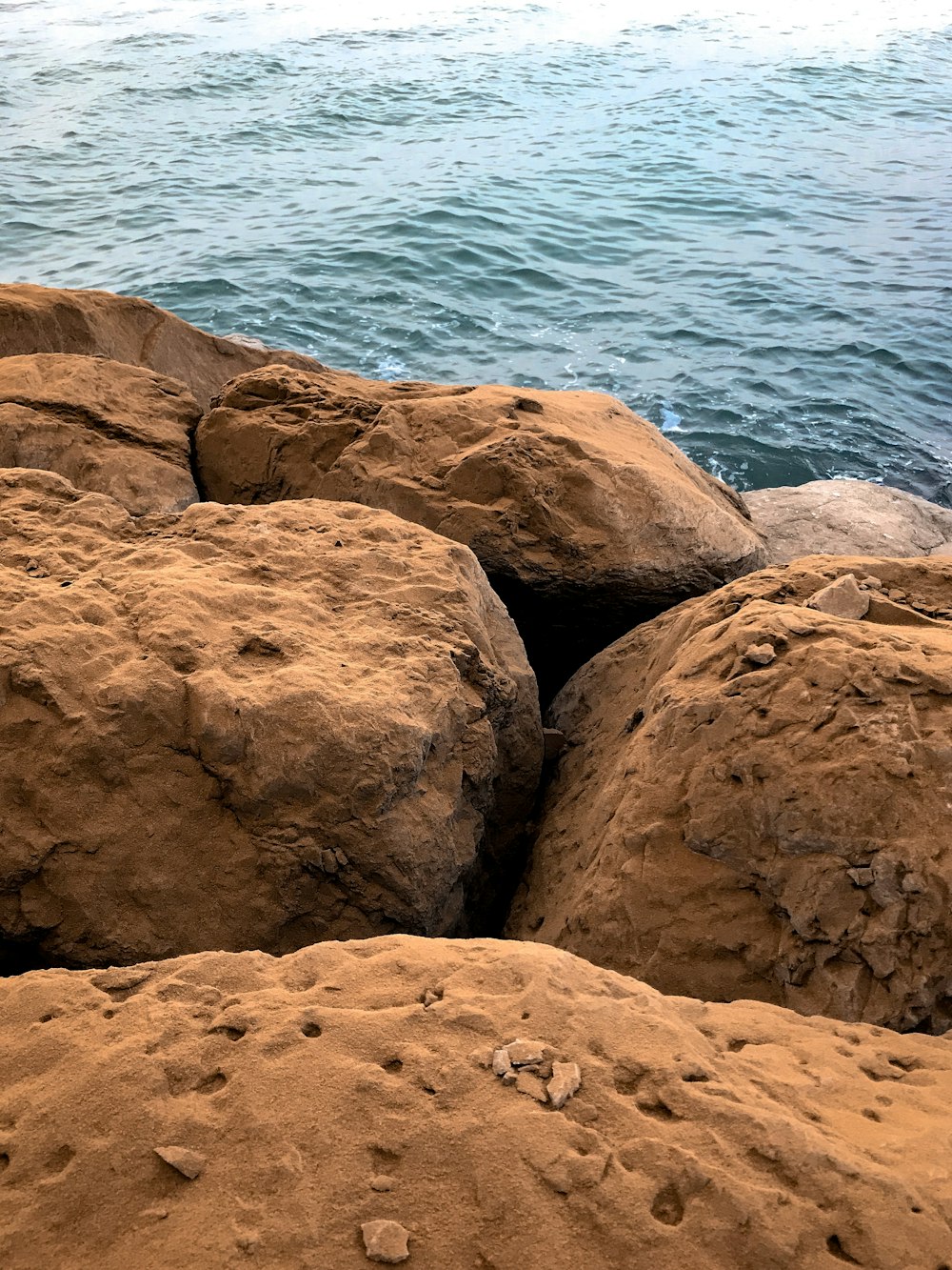 rock beside sea