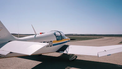 white biplane